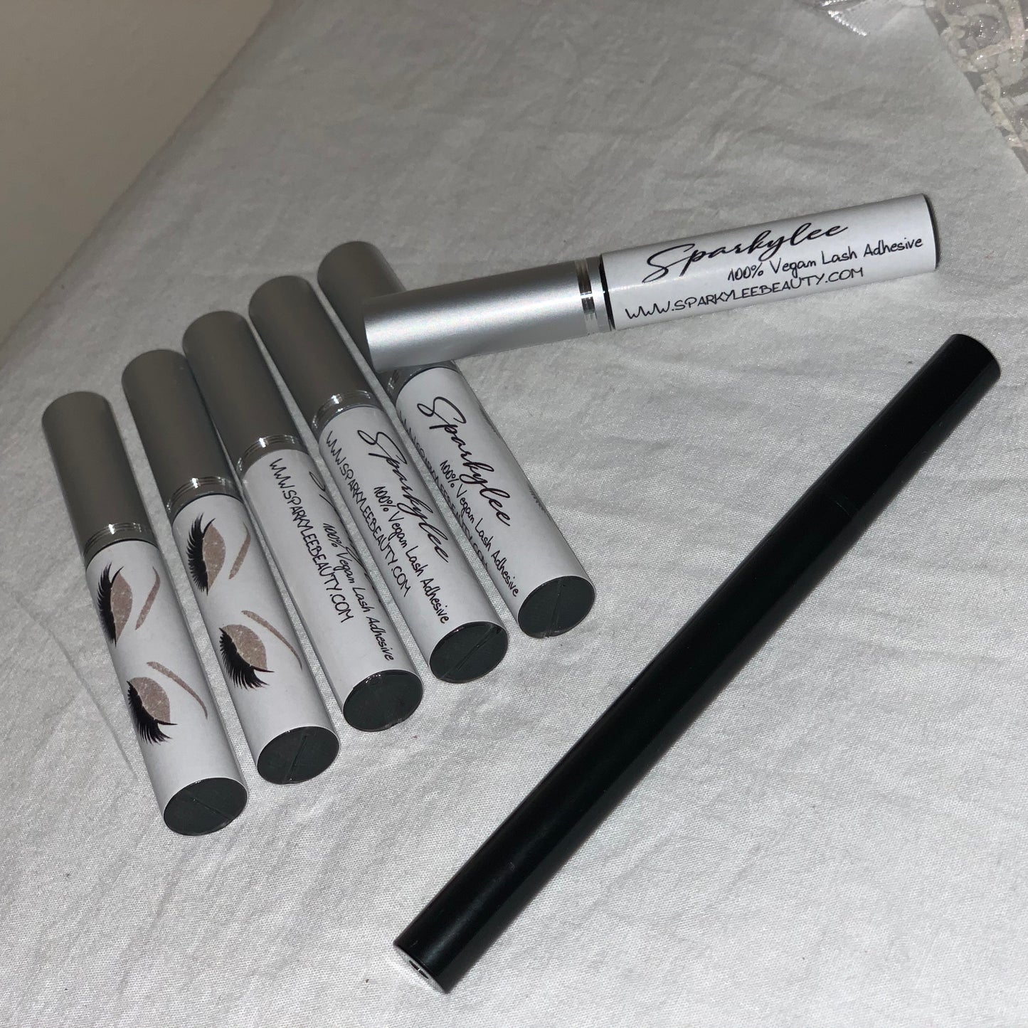 BLACK LASH ADHESIVE. - SPARKYLEE